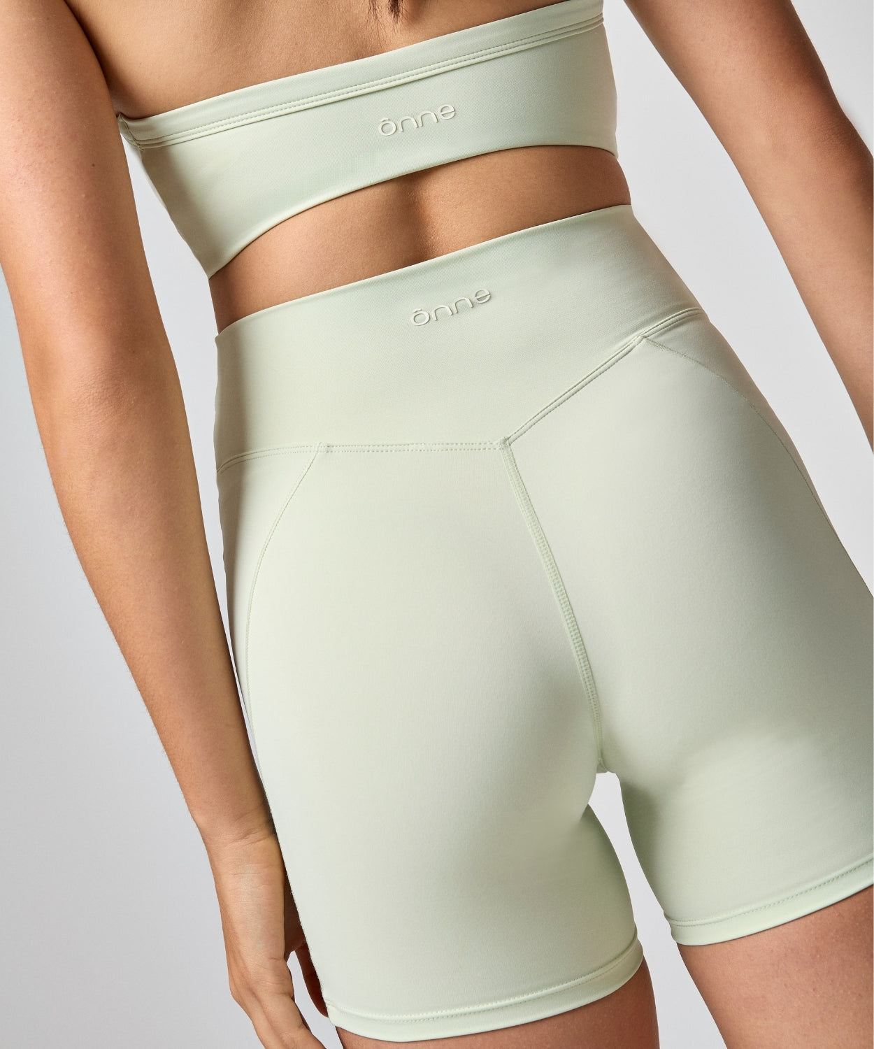 Bali Short in Light fruit green, back view, ÔNNE activewear